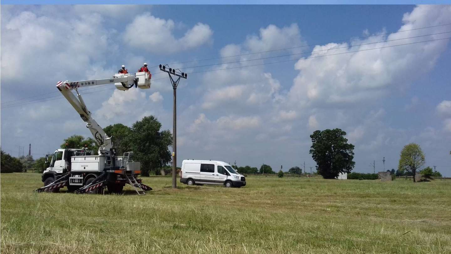 The instalation of insulators on electric power lines in Šurany
